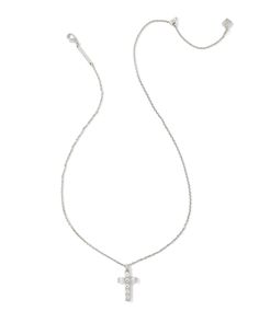 A meaningful symbol gets a touch of glam in the Gracie Silver Cross Short Pendant Necklace in White Crystal. Princess cut crystals are arranged in a sparkling cross shape and paired with a dainty chain. Sweet and full of shine, add this pendant to your everyday style rotation as a reminder of what matters to you most. Metal Rhodium Over Brass Material White Crystal Closure Lobster Clasp W/ Single Adjustable Slider Bead Size 19" Chain, 0.52"L X 0.88"W PendantDue to the one-of-a-kind nature of the Kendra Scott Silver Jewelry, Cross Silver Necklace, Crystal Princess, Short Pendant Necklace, Ninth Grade, Cross Shape, Cross Necklaces, Silver Cross Necklace, Pandora Necklace