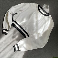 Beautiful Item White Sweatshirt With Contrast Color For Fall, White Fitted Top With Ribbed Cuffs, Sporty White Tops With Striped Cuffs, Spring White Fitted Sweatshirt, White Fitted Sweatshirt For Spring, Fitted White Sweatshirt For Spring, White Striped Cuffs Top For Fall, Chic White Tops With Contrast Stripes, White Tops With Striped Cuffs For Fall