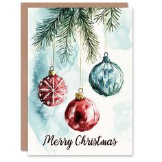 a christmas card with three ornaments hanging from it