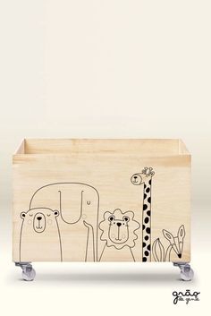 a wooden box with an animal design on it