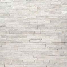 a white brick wall is shown in this image