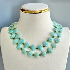 This Double Layered Necklace Features Real Turquoise Faceted Stones With 18kt Gold Plated Details. Pair With A White T-Shirt Or Fancy Dress. Chain 17"L (8.5"L When Clasped) New Condition, Never Worn Elegant Round Amazonite Necklace, Luxury Turquoise Gemstone Beads Necklace, Elegant Double Strand Turquoise Necklace, Turquoise Round Beads Emerald Necklace, Elegant Double Strand Blue Turquoise Necklace, Elegant Blue Amazonite Jewelry, Double Strand Necklace, Real Turquoise, Layered Necklace