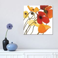 an abstract floral painting on a white wall