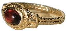 Ancient Heirloom Ring - Garnet |  Rings - Common Era Jewelry Yellow Gold Ruby Ring With Intricate Design For Promise, 14k Yellow Gold Ruby Ring With Intricate Design, Oval Yellow Gold Jewelry With Decorative Band, Yellow Gold Oval Jewelry With Decorative Band, Decorative Oval Yellow Gold Jewelry, Ceremonial 14k Gold Jewelry With Historical Design, Classic Ceremonial Jewelry With Decorative Band, Elegant 14k Gold Ceremonial Rings, Traditional Yellow Gold Jewelry With Decorative Band