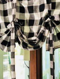 a black and white checkered curtain with the words make your own tie up curtains