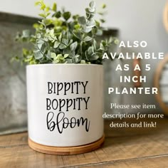 a plant in a mug with the words happy bloppty bloom on it