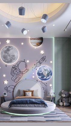 this is a bedroom with a space theme painted on the wall and lights hanging from the ceiling