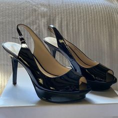 Never Wornnine West, Open Toe, Black Patent Leather 4” Sling Back Heels. Black Patent Leather Slingback Pumps With 4-inch Heel, Sleek Black Slingback Pumps With 4-inch Heel, Sleek Black Slingback Heels, Sleek Black High Heel Slingback Pumps, Black Platform Slingback Pumps For Formal Occasions, Classic Black Slingback Pumps For Party, Elegant Black Platform Slingback Pumps, Formal Black Platform Slingback Pumps, Sling Back Heels