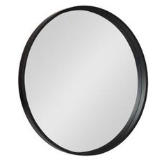 a round black mirror on a white background