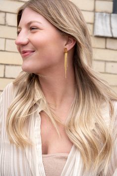 Our Tatiana Earrings, featuring a gold tassel dangle, are coming in hot, and they are going to be your new faves! They're ultra lightweight, so you can wear them all day and night without feeling weighed down – but trust us, they still pack a punch. You'll feel like you're walking down the runway every time you wear them. The playful tassel sways with every movement and adds just the right amount of flirtatious fun to your look. 18k gold-plated stainless steel Hypoallergenic Tarnish resistant Wa Earrings Square, Long Gold Earrings, Steel Earrings, Square Pendant, Light Weight Earrings, Stainless Steel Earrings, Day And Night, Elegant Earrings, Style Chic