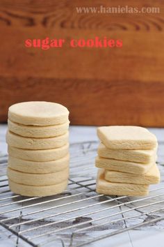 sugar cookies stacked on top of each other on a cooling rack with text overlay