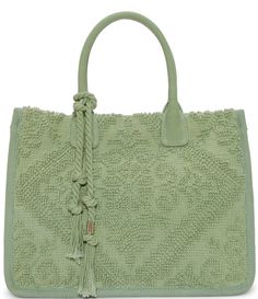 From Vince Camuto&#x2C; this tote bag features: Canvas UpperMagnet ClosureExterior: 1 Back Slip PocketInterior: 1 Slip PocketHardware Color: PlatinumBag Branding: Emboss LogoApprox.: 16" W x 12" H x 5" DImported. 40th Birthday Funny, Popular Handbags, Kids Luggage, Bag Canvas, Wall Pockets, Travel Tote, Canvas Texture, Dillard's, Embossed Logo