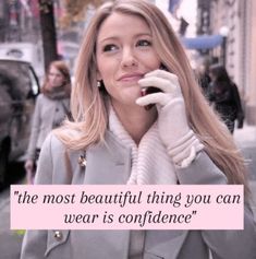 a woman talking on a cell phone while wearing a gray coat and white gloves with the words, the most beautiful thing you can wear is confidence