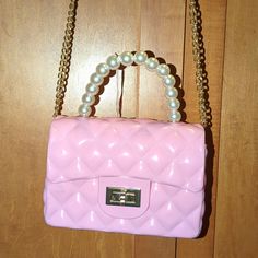 New With Tag, Nonsmoking Home, Excellent Condition. Faux Pearl Handle And Gold Shoulder Chain. Pink Rectangular Shoulder Bag With Pearl Handle, Trendy Pink Bag With Pearl Handle, Trendy Pink Shoulder Bag With Pearl Handle, Pink Bag With Pearl Handle For Daily Use, Pink Bags With Pearl Handle For Daily Use, Luxury Pink Bag With Pearl Handle, Jelly Purse, Shoulder Chain, Pink Mini