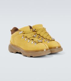 Find BURBERRY Leather Hiking Boots on Editorialist. Upper: leather. Lining: fabric. Sole: fabric insole, rubber sole. Toe shape: round toe. Made in Italy. Includes: shoe box. Designer color name: Manilla. Closure: lace-up. Trim: brass, polyester. Leather Hiking Boots, Burberry Shoes, Lining Fabric, Shoe Box, Hiking Boots, Jewelry Shop, Rubber Sole, Clothing And Shoes, Burberry