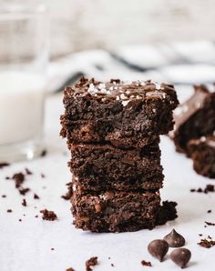 three chocolate brownies stacked on top of each other