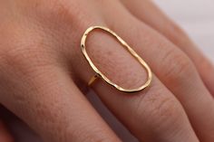 14K Gold Large Oval Karma Ring is now available. Both the oval and band have been hammered by hand for added sparkle and shine. The Oval Karma Ring is meant to attract good karma to you and those around you as well as remind you that what comes around goes around. Now available in 14K Yellow Gold, 14K Rose Gold and 14K White Gold. Love this? Check out our Bestseller 14K Gold Circle Karma Ring here: https://www.etsy.com/WhiteSandJewelry/listing/779795015/solid-gold-karma-ring-14k U.S. ring sizes Hammered Oval Wedding Rings, Oval Hammered Wedding Rings, Modern Oval Hammered Jewelry, Modern Hammered Oval Jewelry, Oval Hammered Jewelry For Wedding, Oval Hammered Wedding Jewelry, Karma Ring, Gold Oval Ring, Hippie Rings