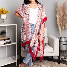 "Get ready to make a statement with our Alina Paisley Floral Patchwork Kimono! Perfect for any occasion, this kimono features vibrant paisley and floral prints, creating a unique and eye-catching look. With its lightweight and flowy design, it's the perfect addition to your wardrobe. Perfect for both beaches and festivals! 100% Viscose One Size Fits Most 0-14 Length: 38\" Bust: 36\"" Spring Bohemian Paisley Print Kimono, Spring Kimono With Paisley Print And Kimono Sleeves, Casual Summer Kimono With Paisley Print, Casual Summer Paisley Print Kimono, Spring Paisley Print Open Front Kimono, Casual Spring Paisley Print Kimono, Spring Open Front Paisley Print Kimono, Bohemian Multicolor Floral Print Kimono, Floral Print Shawl Kimono For Spring