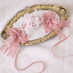 Elevate your kawaii look with our bead details pink bowknots sweet lace hairband. This adorable hair accessory features delicate lace, charming pink bowknots, and intricate bead details. It's the perfect addition to any Lolita or Kawaii outfit, adding a touch of sweetness to your ensemble.  Please note that this product includes only one hairband. Elegant Pink Ribbon Hair Accessories, Elegant Pink Hair Accessories With Ribbon, Adjustable Pink Headband With Bow, Adjustable Pink Bow Headband, Adjustable Pink Bow For Wedding, Cute Ribbon Bow For Wedding, Pink Headband With Decorative Bow As Gift, Pink Headband With Decorative Bow For Gift, Pink Decorative Bow Headband For Gift