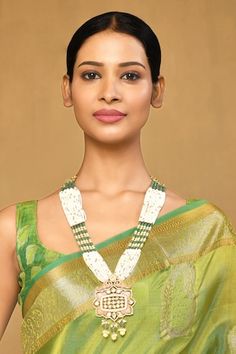 Gold plated carved kundan pendant necklace with green stones and pearl multi strings. - Aza Fashions Necklace With Green Stones, Necklaces Green, Necklaces Long, Jewellery Necklaces, Green Stones, Green Metal, Green Pearls, Necklace Online, Green Necklace