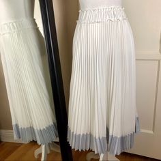 Beautiful Clu White Pleated Long Skirt With Blue Bottom; Elastic Waist Band; Lined; New Without Tag. Length: 28” Fabric: 100% Polyester Care: Dry Clean Only Made In Usa Elegant White Tiered Pleated Skirt, White Pleated Hem Skirt For Day Out, White Midi Skirt For Spring, White Long Skirt With Pleated Hem, White Fitted Midi-length Pleated Skirt, Long White Skirt With Pleated Hem, White Flowy Pleated Midi Skirt, Fitted Pleated Bottoms For Brunch, White Pleated Midi Skirt For Spring