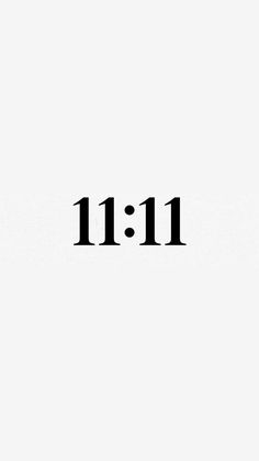 the word 11 11 is written in black on a white background