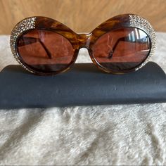 Vintage 70s Rhinestone Sunglasses Style "Havana" By St. Moritz With Original Lenses. Size 56-16-140 Mm Frame Color: Tortoise. This Is In Perfect Condition Pls Refer To The Photos Size: 56-16-140 Mm Hinge To Hinge Measurements: 5 Inches. Frame Color: Tortoise With Rhinestones Brand: St. Moritz This Is True Vintage Were Manufactured In British Hong Kong. Absolutely Stunning Sunglasses The Original Sunglasses Lenses Which Are In Perfect Condition. No Case But I Can Include A Nice Case British Hong Kong, Rhinestone Sunglasses, St Moritz, Sunglasses Style, Accessories Vintage, Sunglass Lenses, Colored Sunglasses, True Vintage, Vintage Accessories