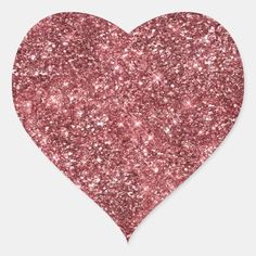 a heart shaped pink glitter sticker