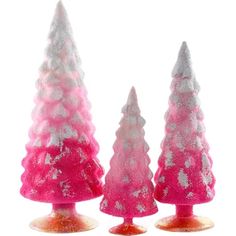 three small pink and silver christmas trees