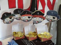 pirate themed desserts are on display at a party