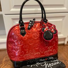 Bought This At Disney World, But I Never Used It. Very New With Dust Bag. Cute Red Rectangular Satchel, Cute Red Satchel For Daily Use, Disney Mickey Mouse Bags For Gifts, Cute Red Satchel Bag, Cute Red Satchel For Everyday Use, Cute Mickey Mouse Bag For Daily Use, Cute Red Bag For Disney Trips, Cute Mickey Mouse Bags For Gifts, Disney Red Rectangular Bag