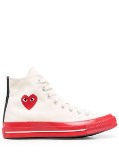 heart patch high-top sneakers from COMME DES GARÇONS PLAY featuring bone white, red, signature heart patch, ankle-length, front lace-up fastening, round toe and flat rubber sole. | Comme des Garçons PLAY Heart Patch High-Top Sneakers Play X Converse, Tenis Converse, Play Heart, Heart Patch, High Top Trainers, Heart Patches, Latest Fashion Design, Comme Des Garcons Play, Chuck 70