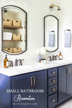 a bathroom with double sinks and two mirrors