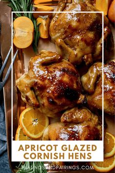 an image of apricot glazed chicken with oranges and rosemary