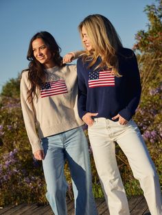 Our American Flag Sweater is an all-American classic with a timeless blend of elegance and patriotism. Made of 100% cotton this sweater is soft and versatile making it the perfect beach sweater for those cool summer nights. All American Fashion, All American Style, Nantucket Vibes, American Flag Outfit, Flag Sweater, School Prep, America Outfit, Date Night Outfit Summer, Beach Sweater