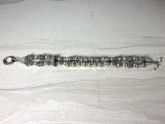 This custom sterling silver and Swarovski crystal bracelet is personalized with the names of children, grandchildren or pets. Up to five strands can be made in one bracelet. Sized according to wrist size. Perfect keepsake that will be cherished forever. $50 per strand (regularly $60 per strand. Please message us names and length needed. If you want a one strand you will order quantity 1, 2 strand quantity 2, 3 strand quantity 3 as so on.... (1 strand $50, 2 strands $100. 3 strands $150, 4 strand Personalized Silver Crystal Bracelet, Adjustable, Personalized Silver Crystal Bracelet, Spiritual Personalized Silver Name Bracelet, Personalized Silver Crystal Bracelet For Anniversary, Swarovski Crystal Bracelet, Name Bracelet, Crystal Bracelet, Grandchildren, Crystal Bracelets