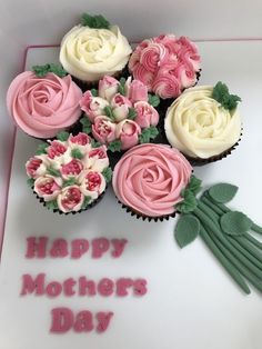 cupcakes decorated with pink and white frosting are on a square plate that says happy mothers day