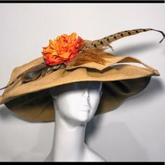 This Lovely Upscale Sun Hat Is Perfect For Fall. It’s Perfectly Suited For Weddings, Garden Parties, And Racing Events. The Hat Is A Wide Brim Straw With Large Pheasant Feather And Bright Orange Flower. This Is A Handcrafted Hat And In Nwt. Elegant Flat Brim Sun Hat For Country Events, Elegant Adjustable Straw Hat For Country Events, Elegant Fedora Sun Hat For Country Events, Elegant Brimmed Top Hat For Country Events, Elegant Short Brim Straw Hat For Country Events, Elegant Brown Hat Bands For Kentucky Derby, Elegant Wide Brim Top Hat For Country Events, Elegant Fitted Straw Hat For Country Events, Elegant Short Brim Hat For Country Events