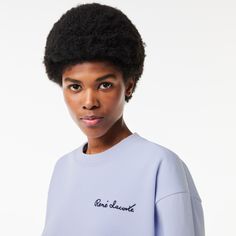 This sweatshirt combines a contemporary cut with double-face piqué fabric. Featuring a ribbed collar and comfortable, sporty styling, topped off with iconic René Lacoste embroidery. Trendy Boxy Fit Crew Neck Sweatshirt, Trendy French Terry Tops With Ribbed Cuffs, Sporty Sweater With Ribbed Neckline For Spring, Trendy Oversized Tops With Ribbed Collar, Long Sleeve Tops With Logo For Loungewear, Casual Spring Sweatshirt With Ribbed Waistband, Boxy Fit Crew Neck Sweatshirt For Spring, Trendy Oversized Top With Ribbed Collar, Long Sleeve Tops With Logo Detail For Loungewear