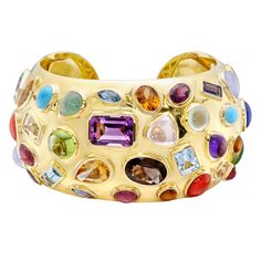 Seaman Schepps "50's" Gem-Set Cuff Bracelet /  "50's" cuff bracelet in 18k yellow gold with multicolored gemstones, including amethyst, tourmaline, citrine, turquoise, lapis, peridot, topaz and carnelian. Numbered and signed by Seaman Schepps /29,950 Seaman Schepps, Latest Jewellery Trends, Smokey Topaz, Modern Bracelets, Gold Bracelet Cuff, Gold Cuffs, Trendy Necklaces, Stone Gold, Latest Jewellery