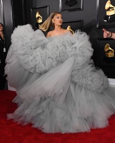 lady in grey gown on red carpet at awards