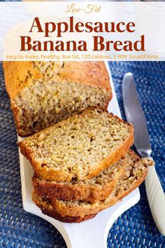 a loaf of banana bread sitting on top of a cutting board