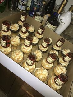 cupcakes in a box with jam on them