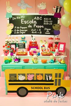 a school bus themed birthday party with balloons