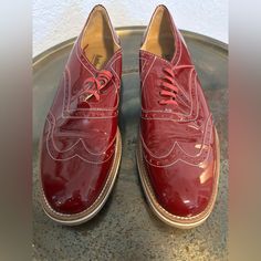 Like New, See Detailed Pictures. Shiny Red Patent Leather Shoe With Laces,Tan And Cream Bottoms And Heel. Red Patent Leather Shoes, Patent Leather Shoes, Detailed Pictures, Shoes Color, Leather Shoes, Patent Leather, Like New, Women Shoes, Cream