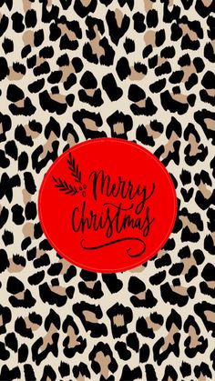 a red merry christmas sign on top of a leopard print background with black and white spots