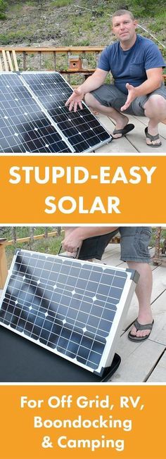 two men are setting up solar panels on the ground, and one man is pointing at them