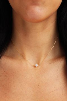 A simple, classic single 6mm pearl graces a dainty, diamond cut minimalistic chain.  Perfect for anyone and everyday!- 14K Gold Filled Chain or Sterling Silver- Swarovski crystalline pearl- Choose length from drop down- Comes perfectly packaged for gift giving! Dainty Solitaire Necklace For Anniversary, Elegant White Charm Necklace For Everyday, Dainty Solitaire Necklace With Delicate Chain For Wedding, Simple Everyday White Jewelry, Simple White Everyday Jewelry, Everyday Simple White Jewelry, Minimalist Pearl Pendant Charm Necklace For Everyday, Simple Delicate Chain Jewelry For Anniversary, Elegant Everyday Charm Necklace With Simple Design