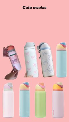 thermos are lined up against a pink background