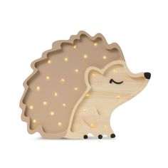 a wooden hedge toy with lights on it's face and eyes, sitting in front of a white background